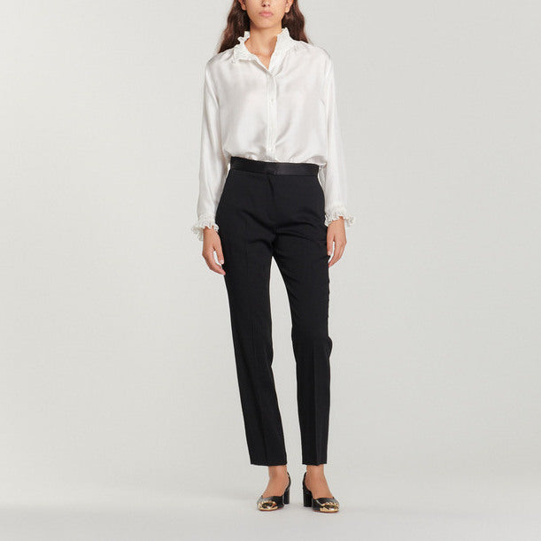 Pantalon avec empiècement de satin Sandro seconde main