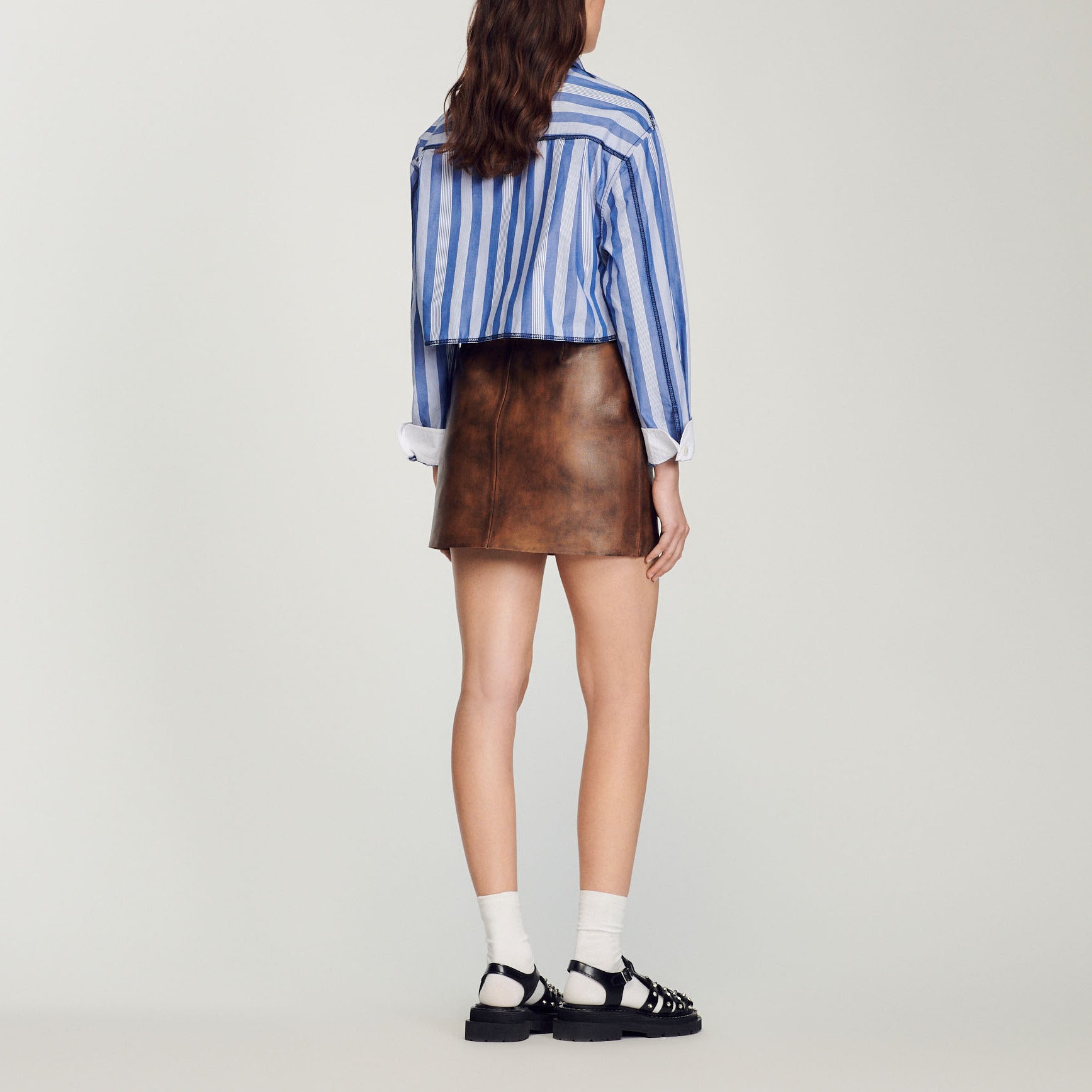 Jupe courte en cuir vieilli Sandro seconde main
