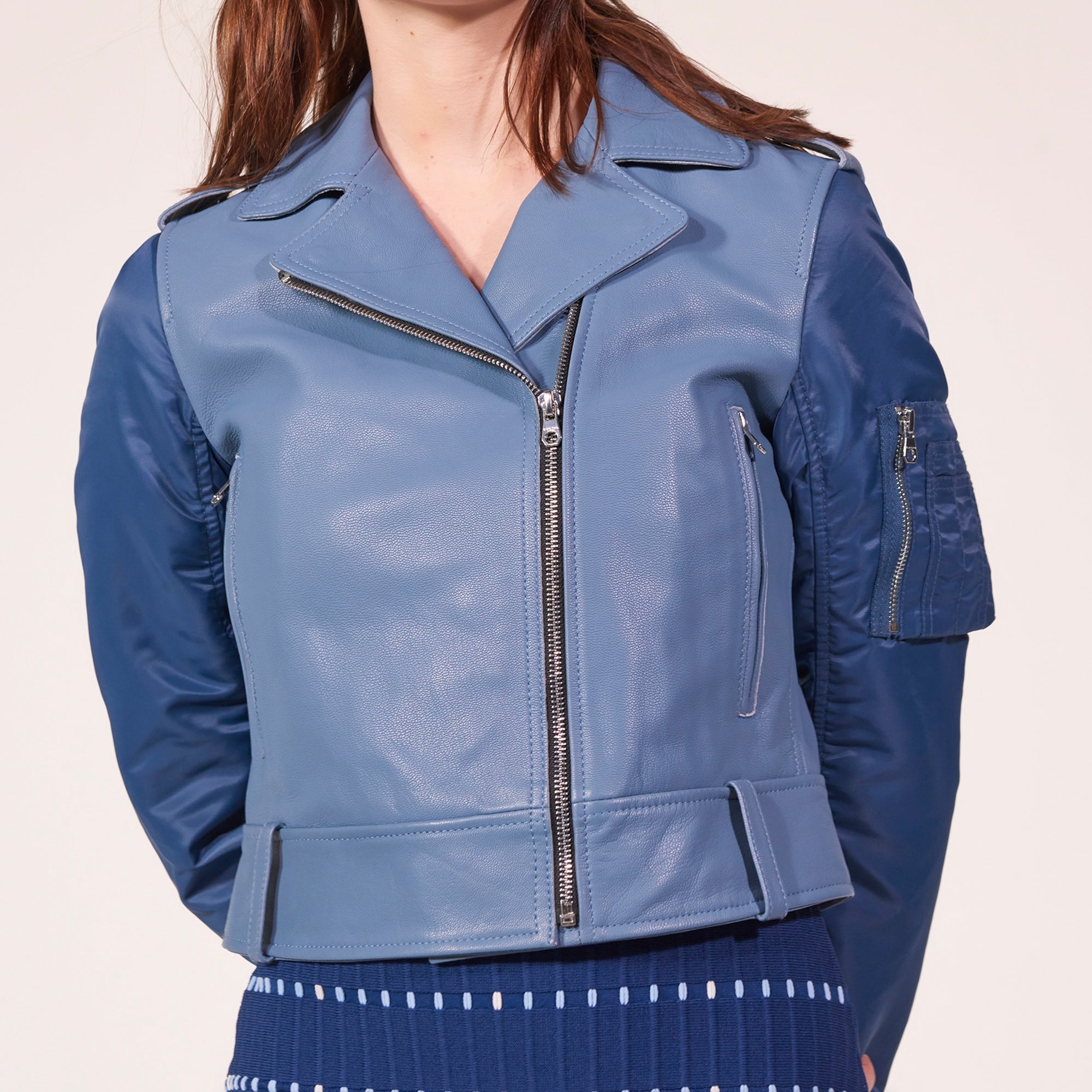 Veste en cuir et manches teddy Sandro seconde main