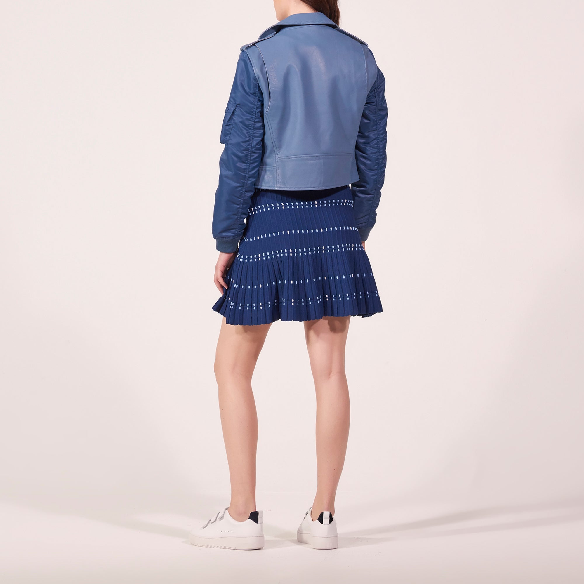 Veste en cuir et manches teddy Sandro seconde main