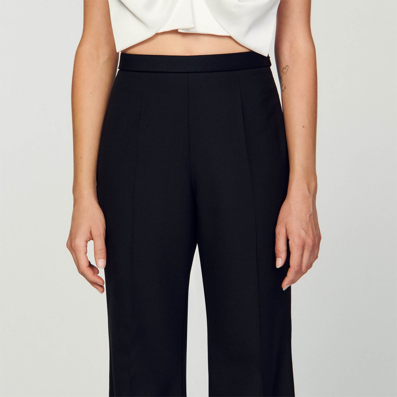 Pantalon évasé Sandro seconde main