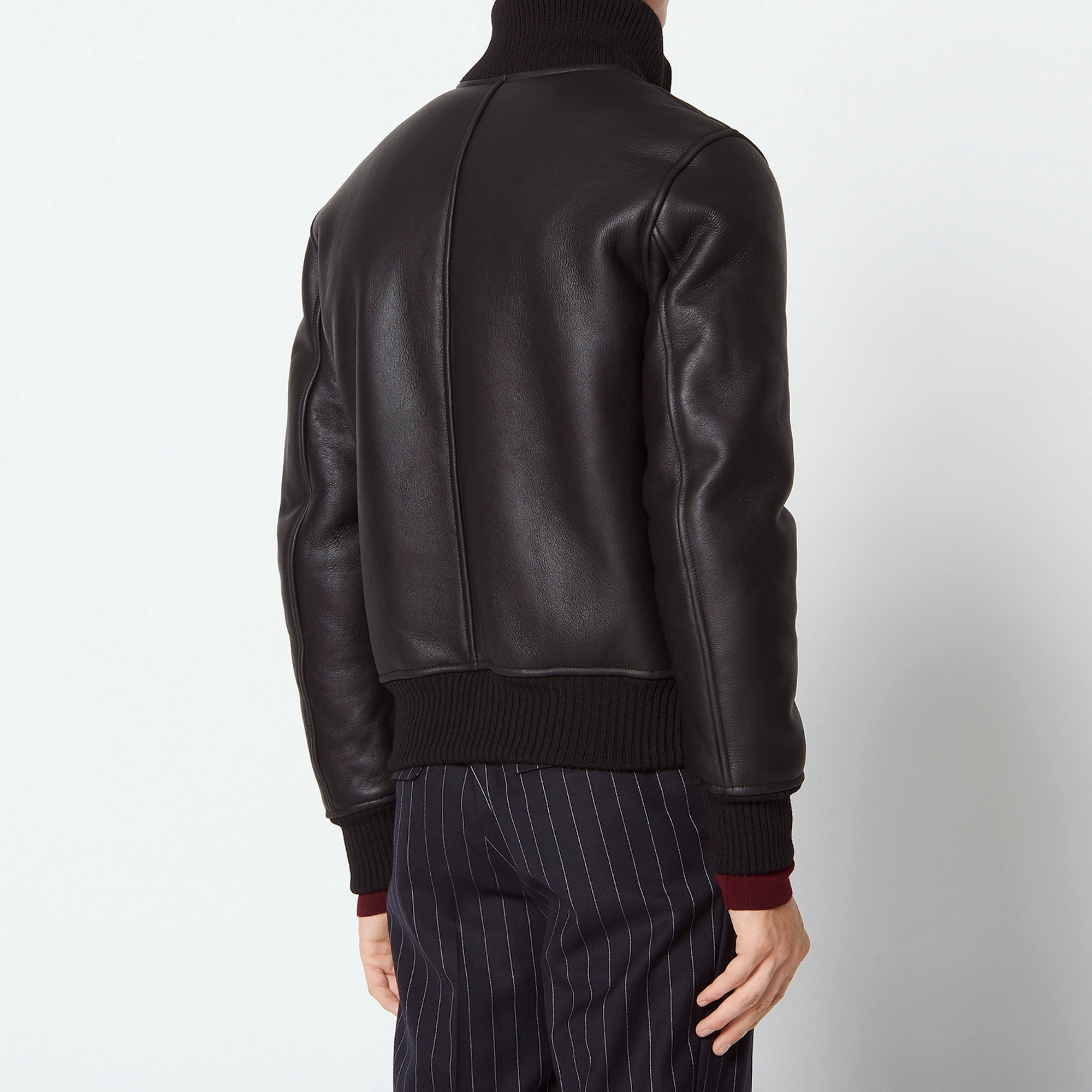Blouson en peau lainée à zip Sandro seconde main