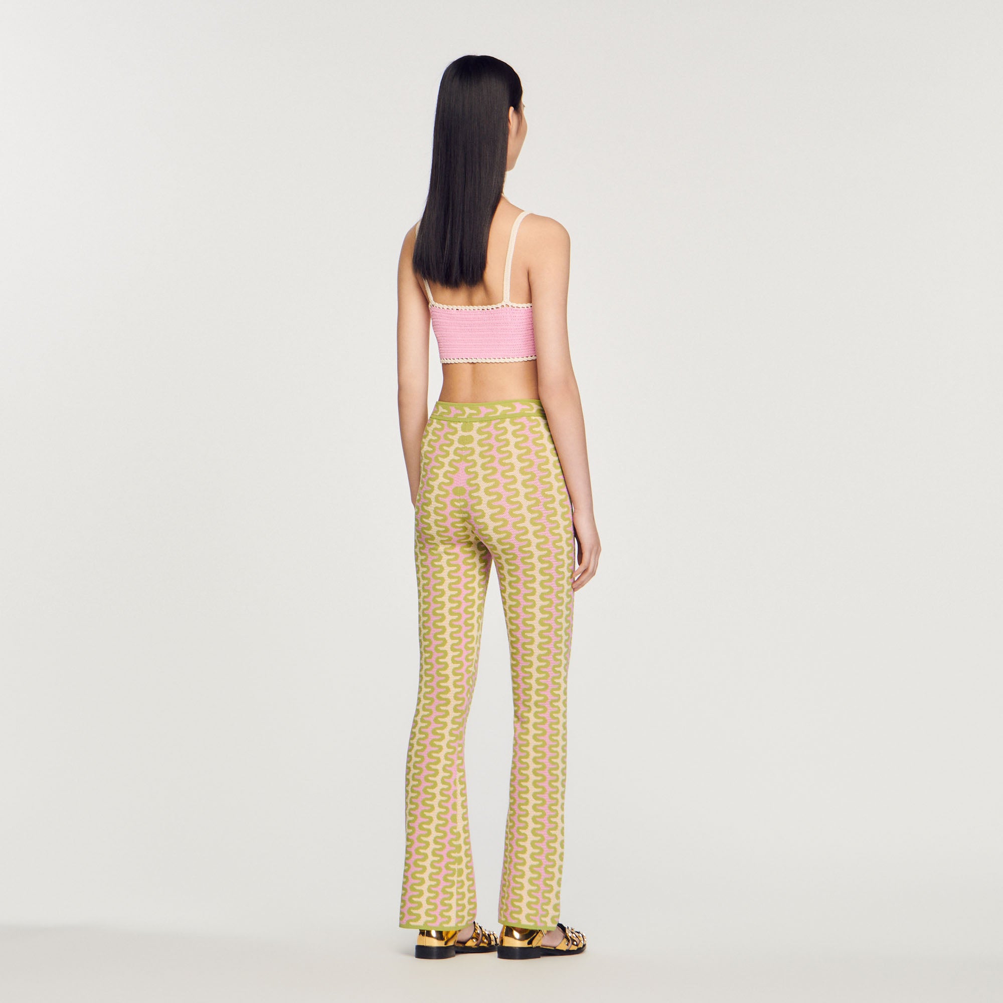 Pantalon en Maille à motifs Sandro seconde main