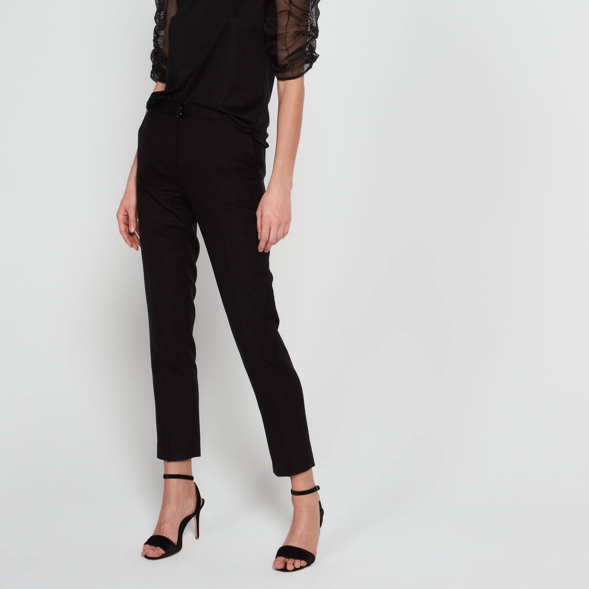 Pantalon à pinces en laine Sandro seconde main