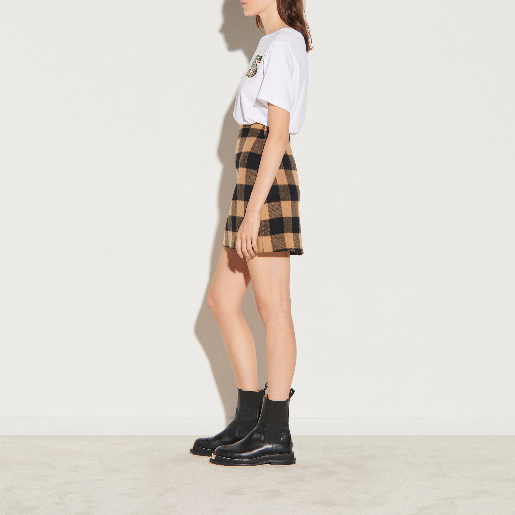 Jupe courte en laine à carreaux Sandro seconde main