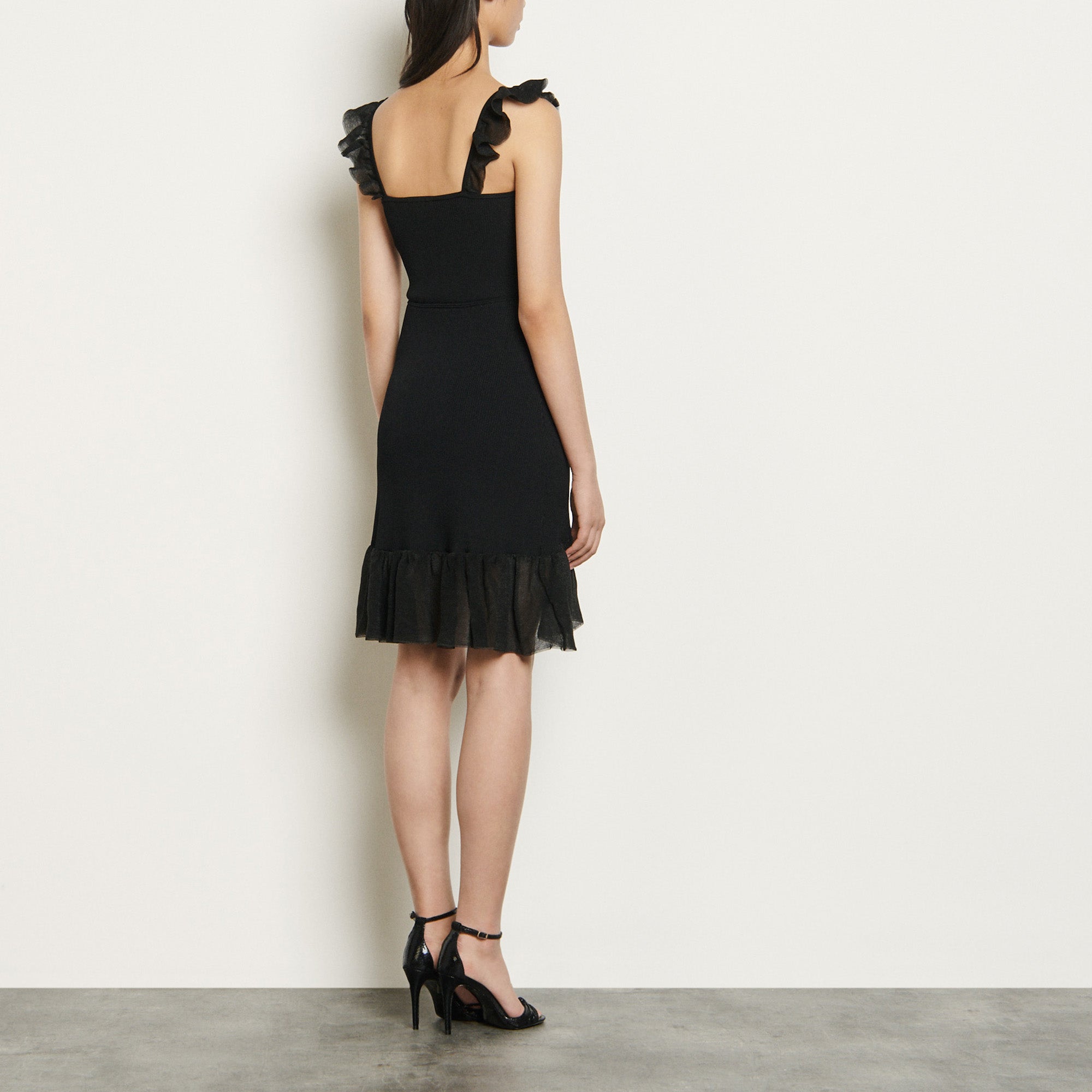 Robe en Maille à bretelles et volants Sandro seconde main