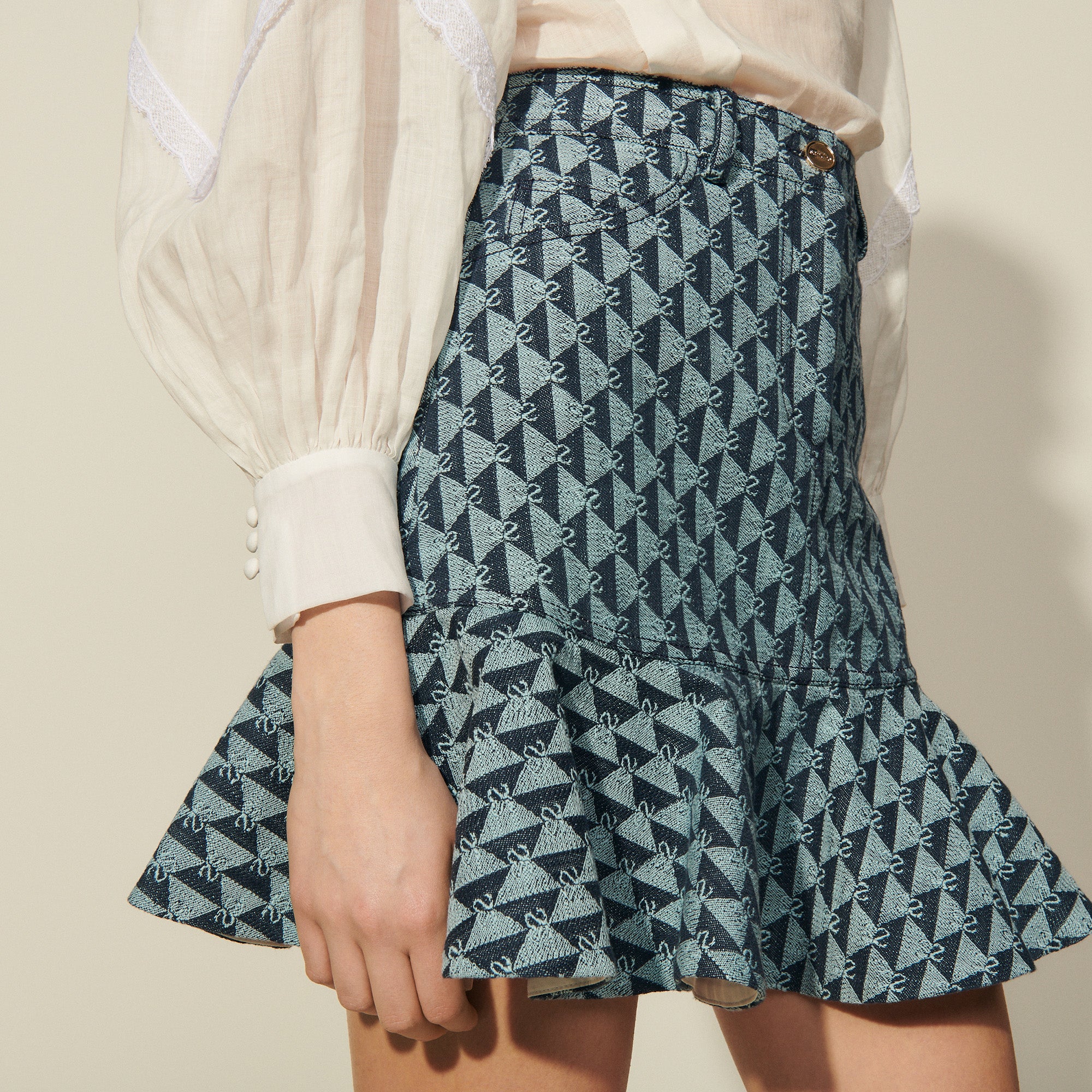 Jupe courte en monogramme denim Sandro seconde main