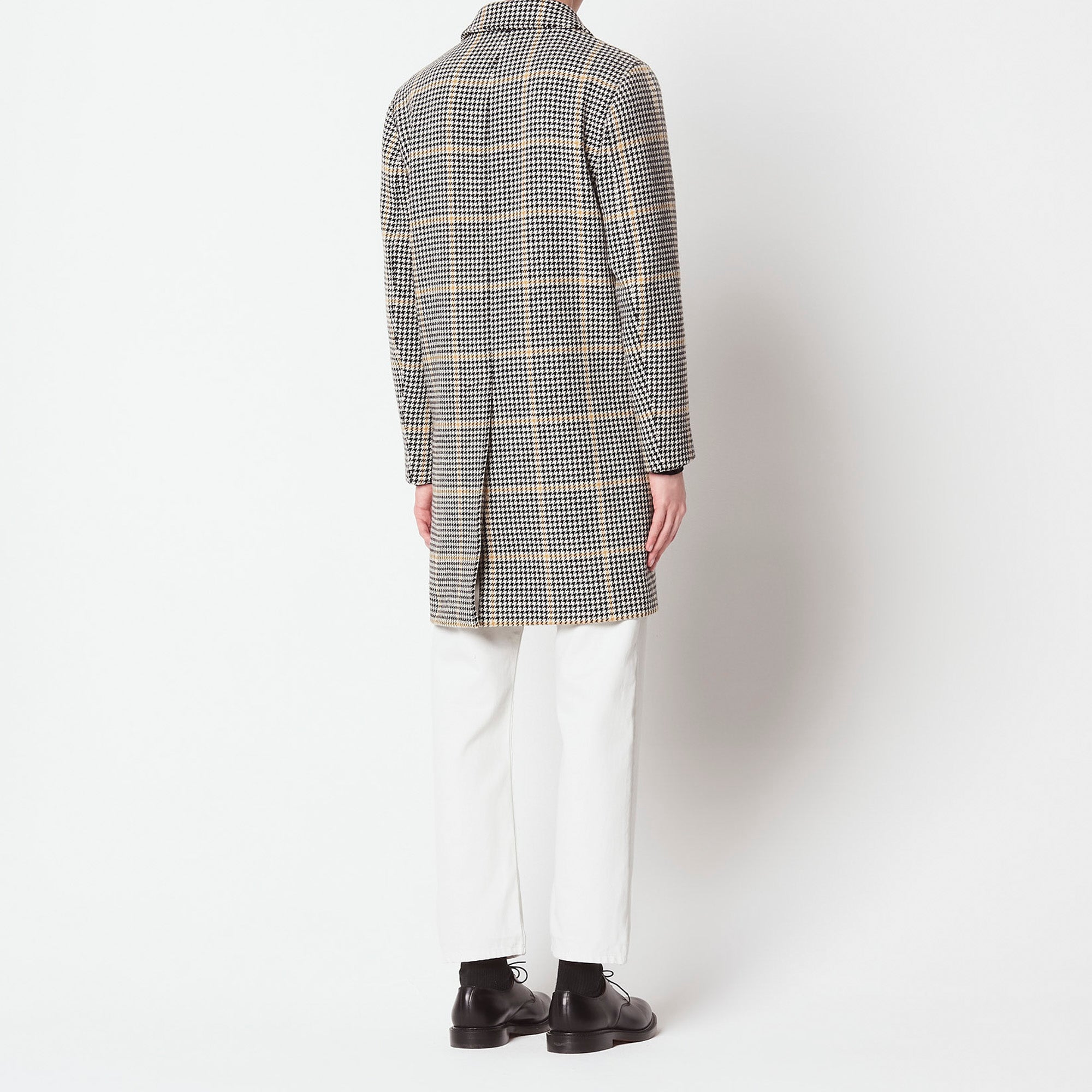 Manteau à carreaux Sandro seconde main