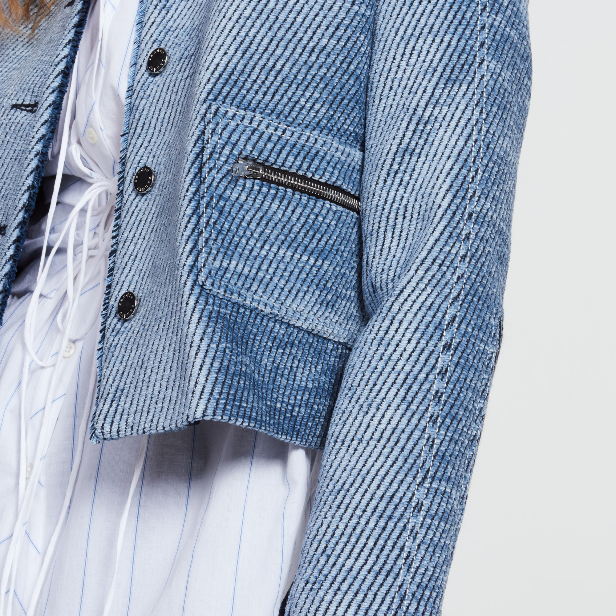 Veste en matière texturée et zips Sandro seconde main