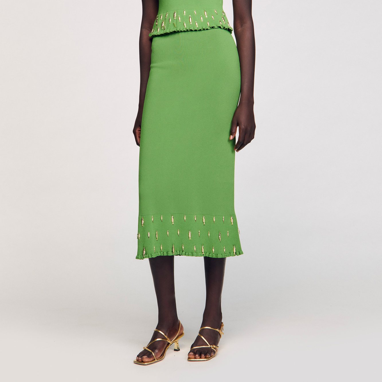 Jupe longue en maille à pampilles Sandro seconde main