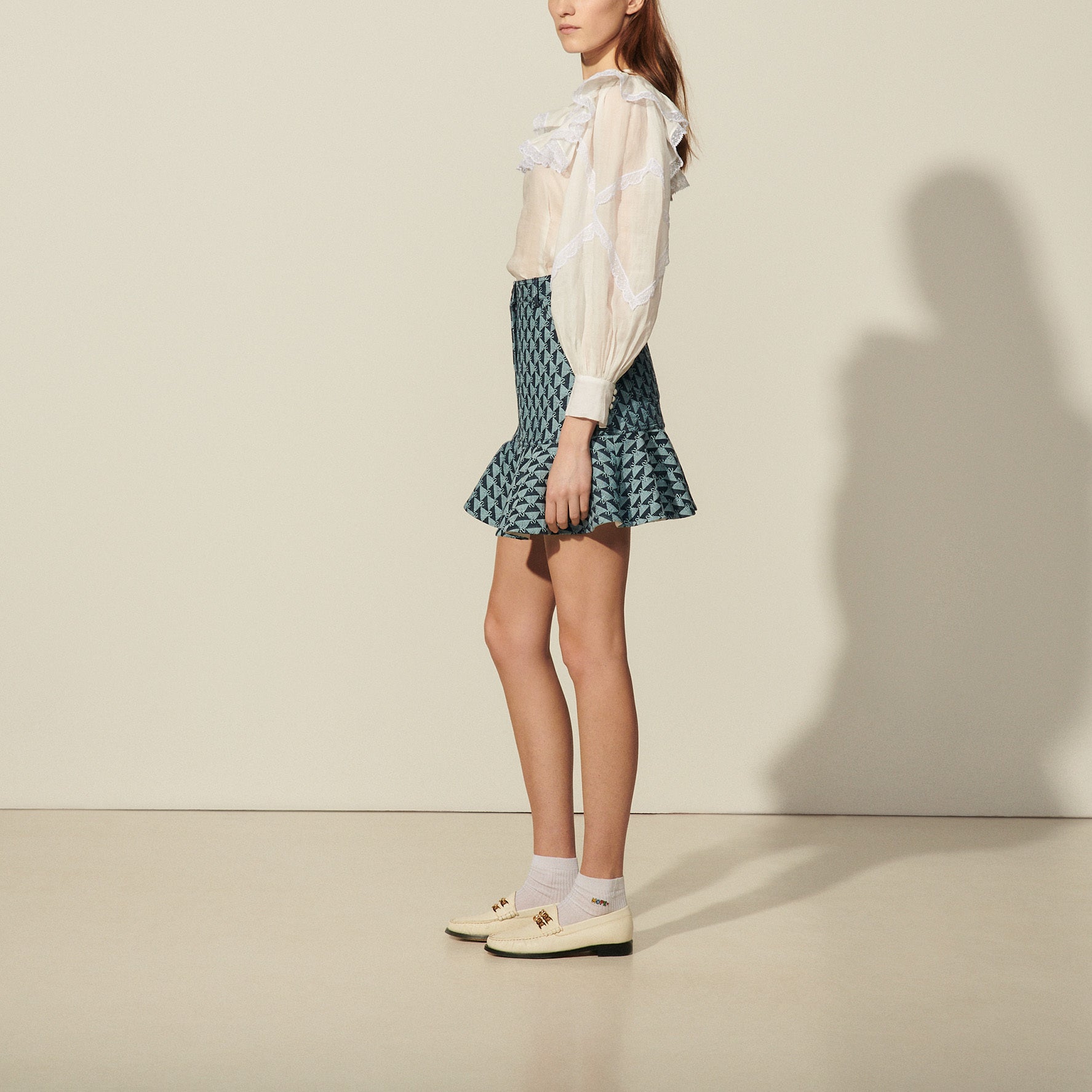 Jupe courte en monogramme denim Sandro seconde main