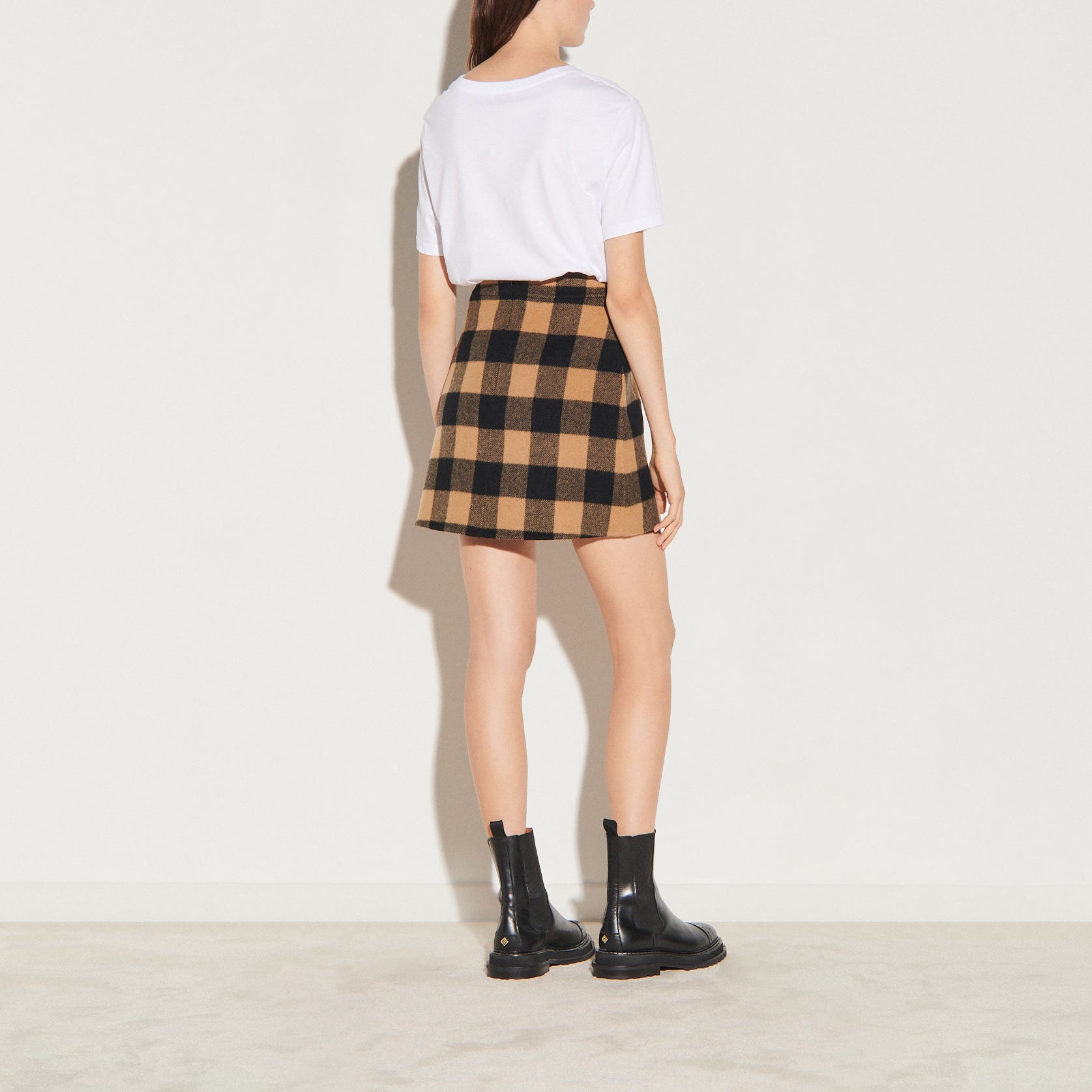 Jupe courte en laine à carreaux Sandro seconde main