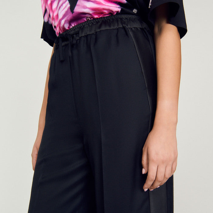 Pantalon large à bande latérale satinée Sandro seconde main