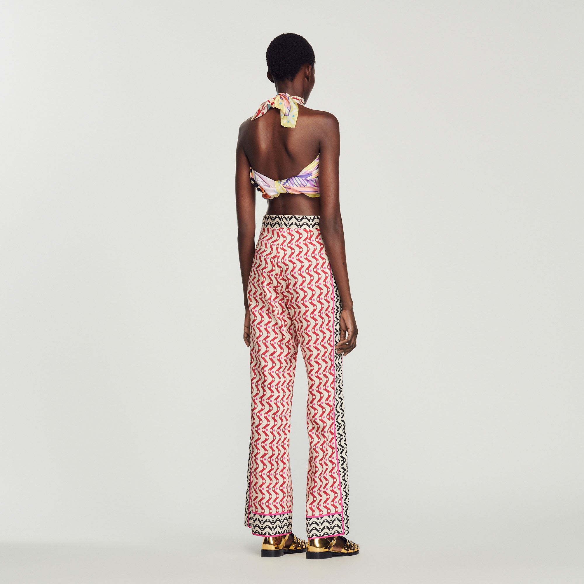 Pantalon fluide imprimé étoiles Sandro seconde main