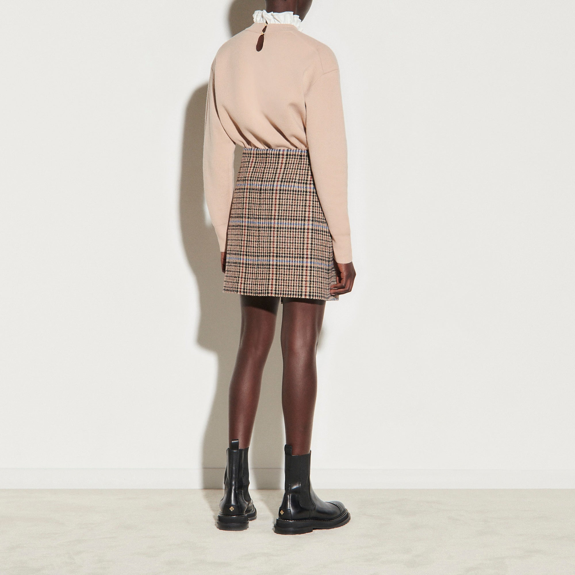 Jupe portefeuille courte en tweed Sandro seconde main