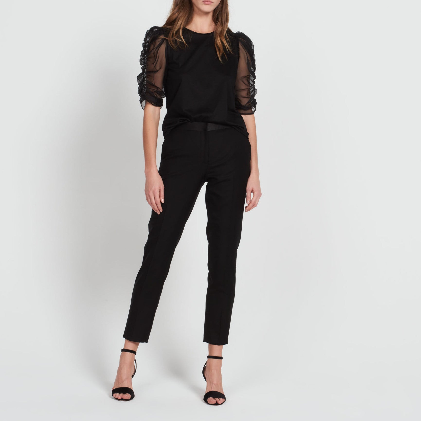 Pantalon à pinces en laine Sandro seconde main