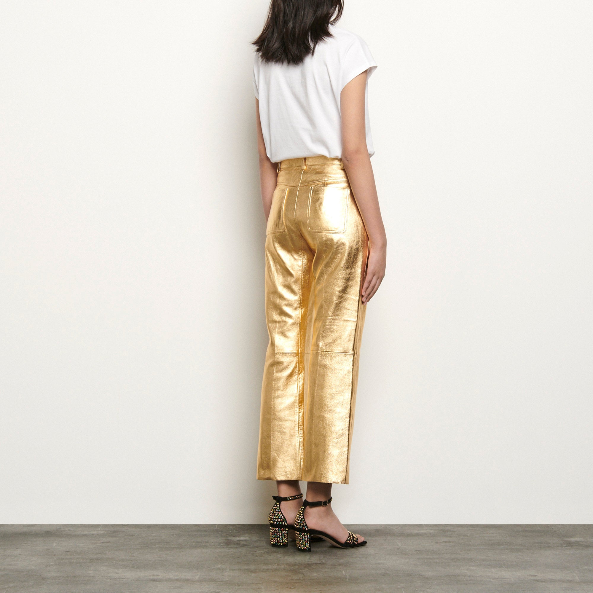 Pantalon en cuir métallisé Sandro seconde main