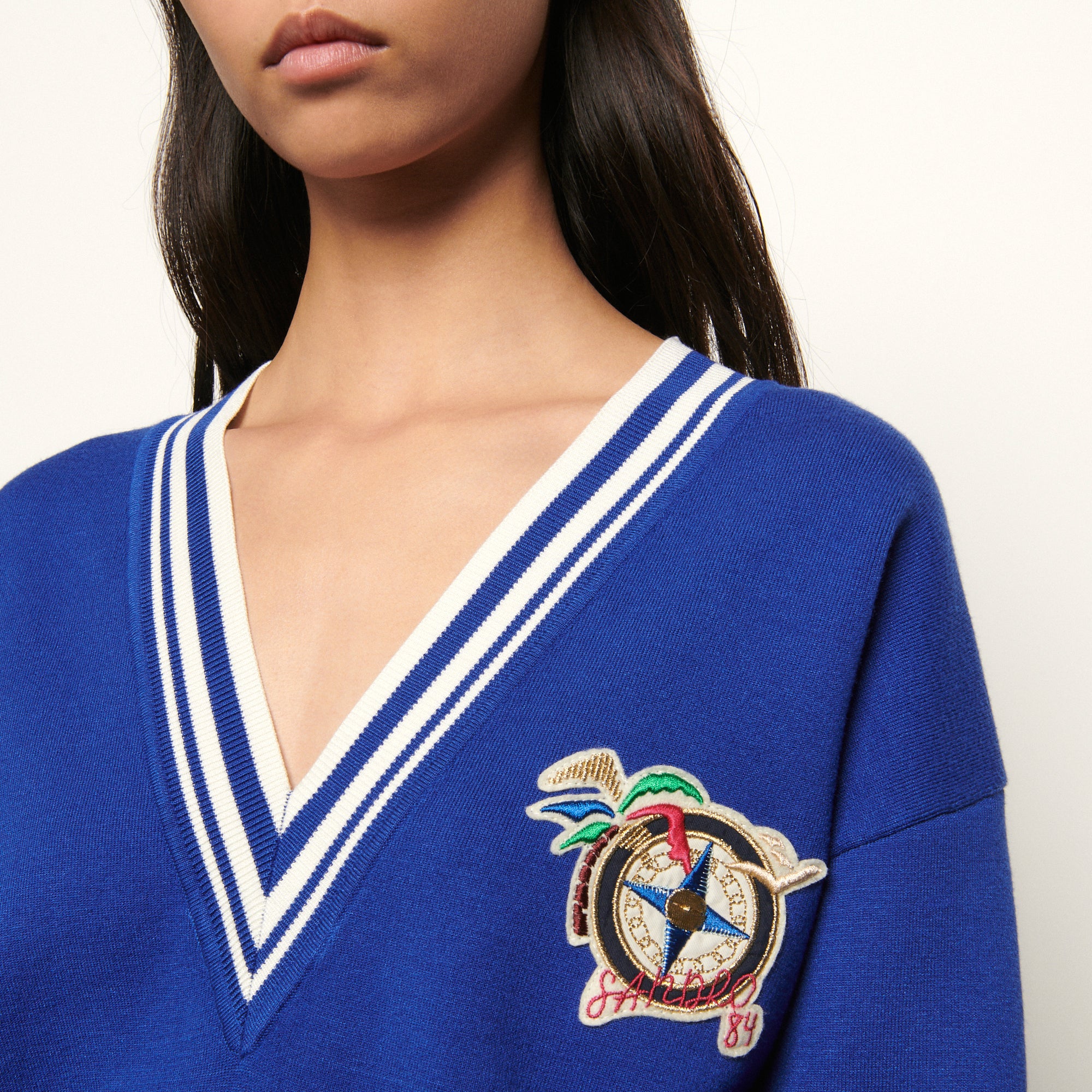 Pull over size avec patch Sandro seconde main