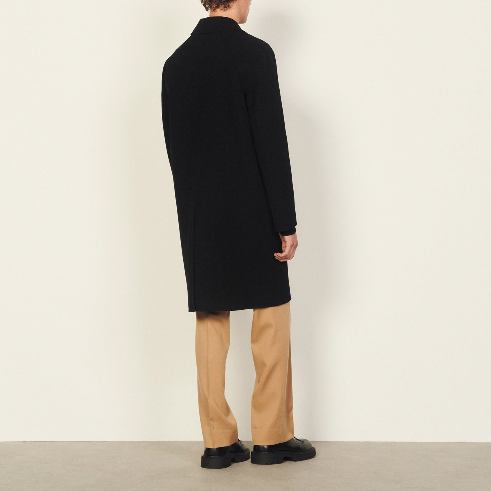 Manteau en laine double face Sandro seconde main