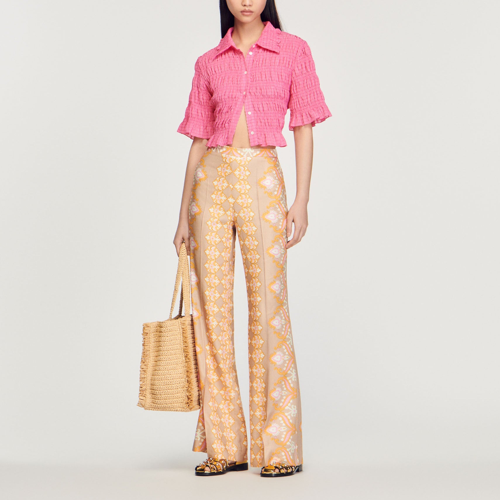 Pantalon fluide imprimé Sandro seconde main